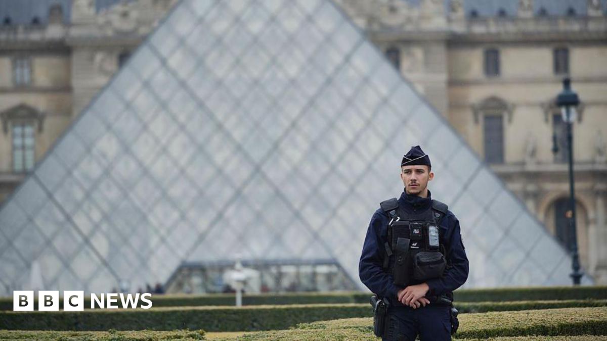 Hunt continues for thieves after priceless jewels stolen in heist at Louvre museum in Paris