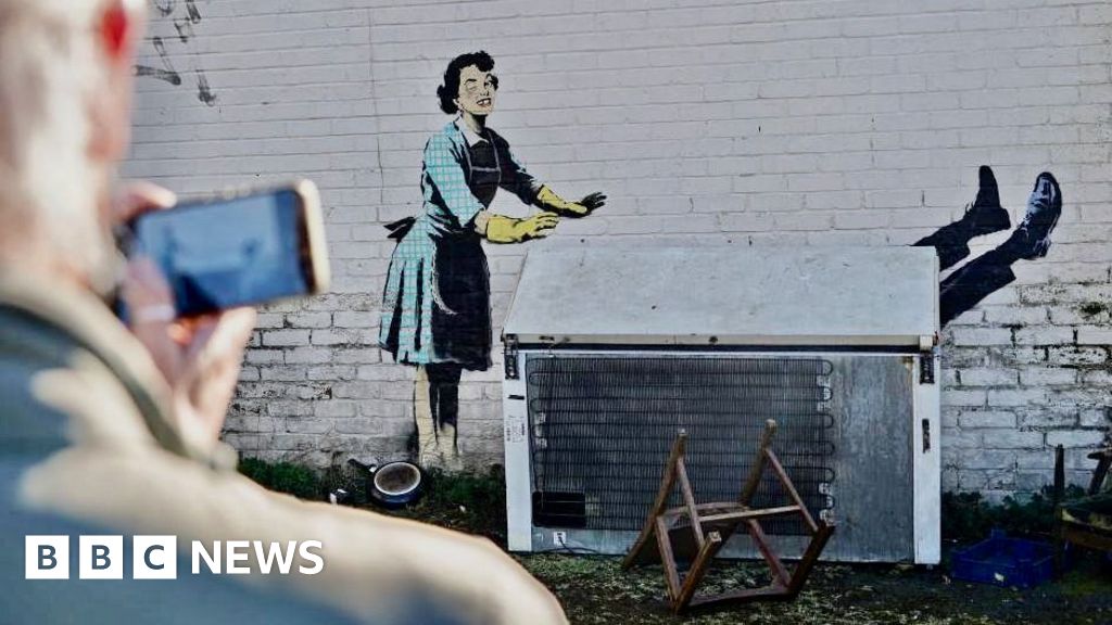 What to do if you wake up with a Banksy on your wall - BBC News