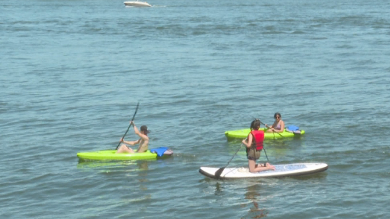 Heat draws more paddleboarders, but new Oregon permit law could bring warning and fines